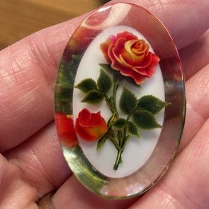 Vintage acrylic brooch with roses